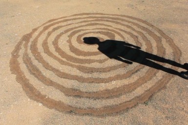 Drawing a spiral to frame a self portrait.jpg
